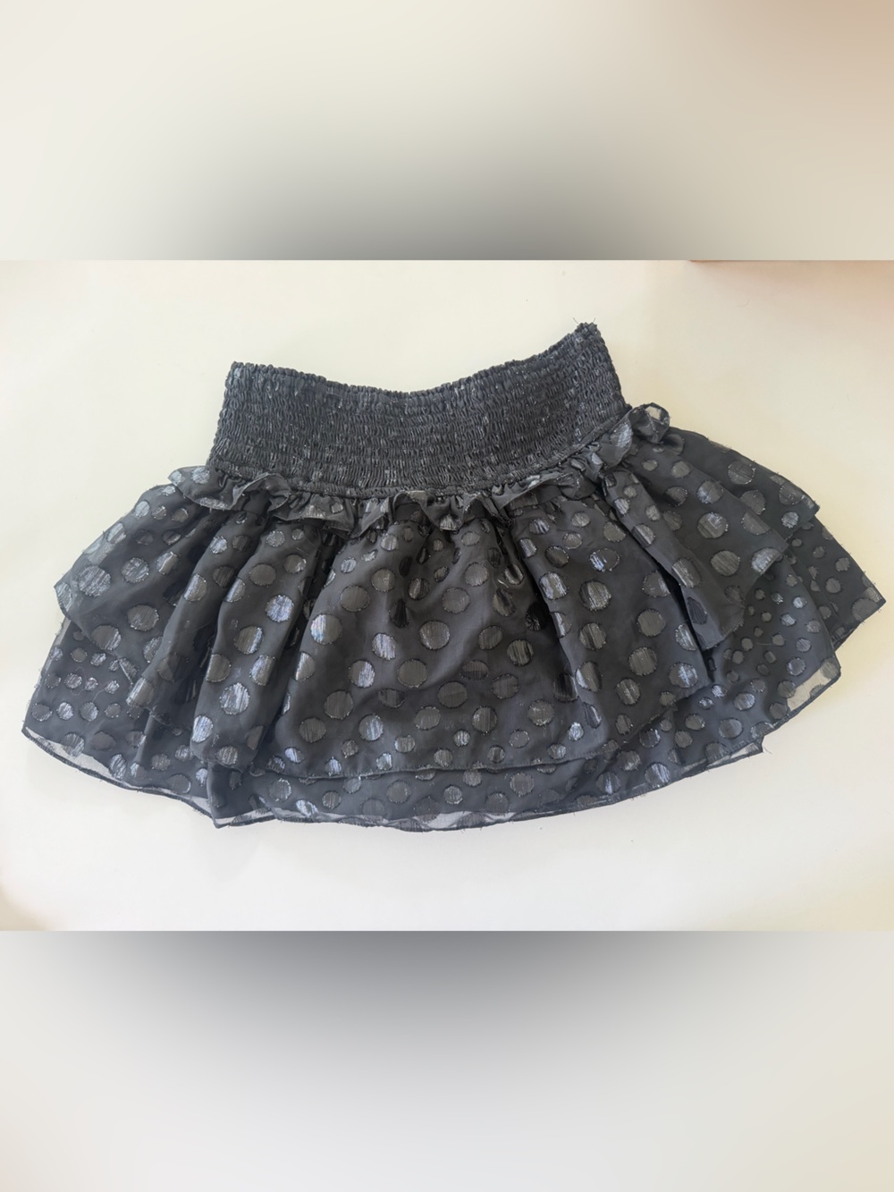 Black polka dot tiered ruffle mini skort